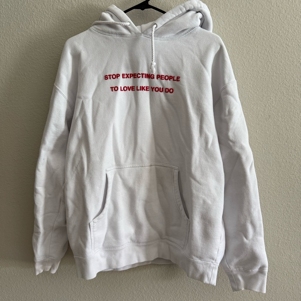 We’re not really strangers white hoodie